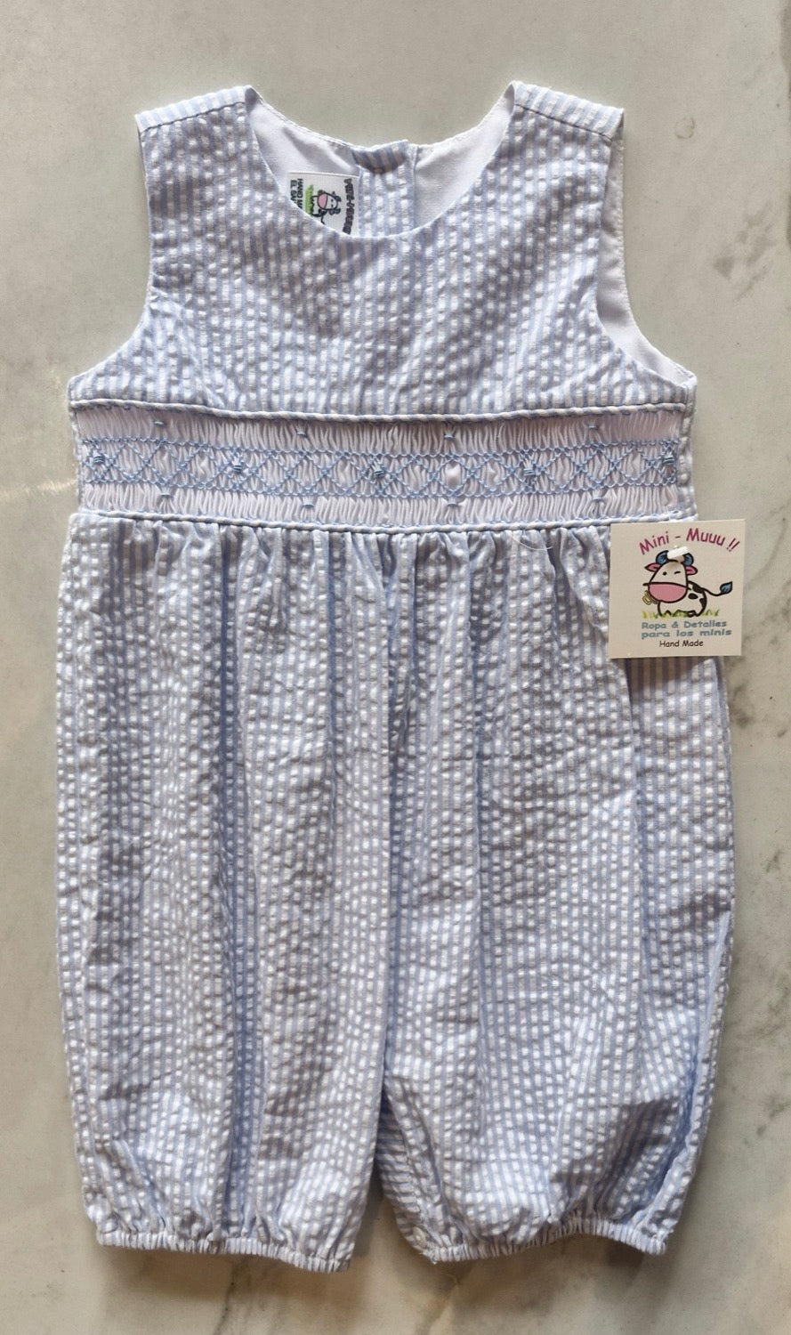 Romper rayas celeste panal
