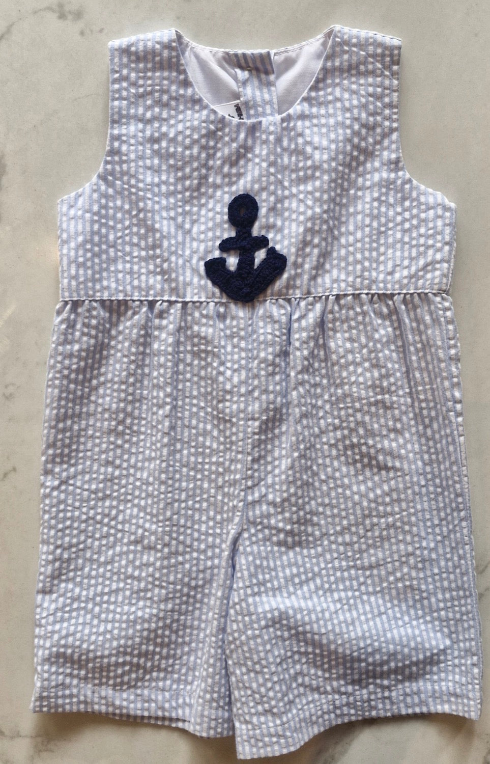 Romper rayas celeste ancla crochet