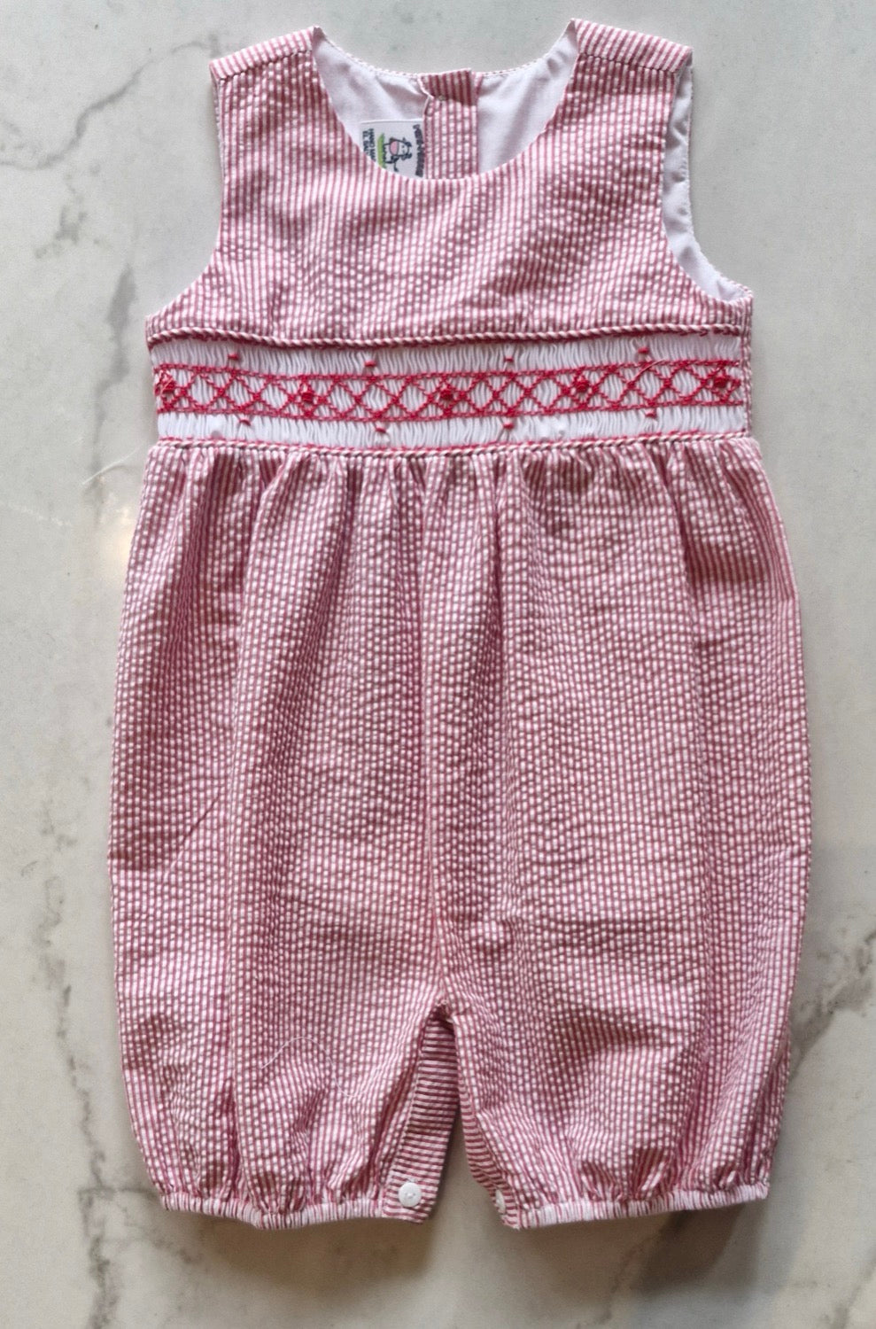 Romper rayas rojas con panal