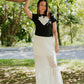 Tee Mariposario negra 2026