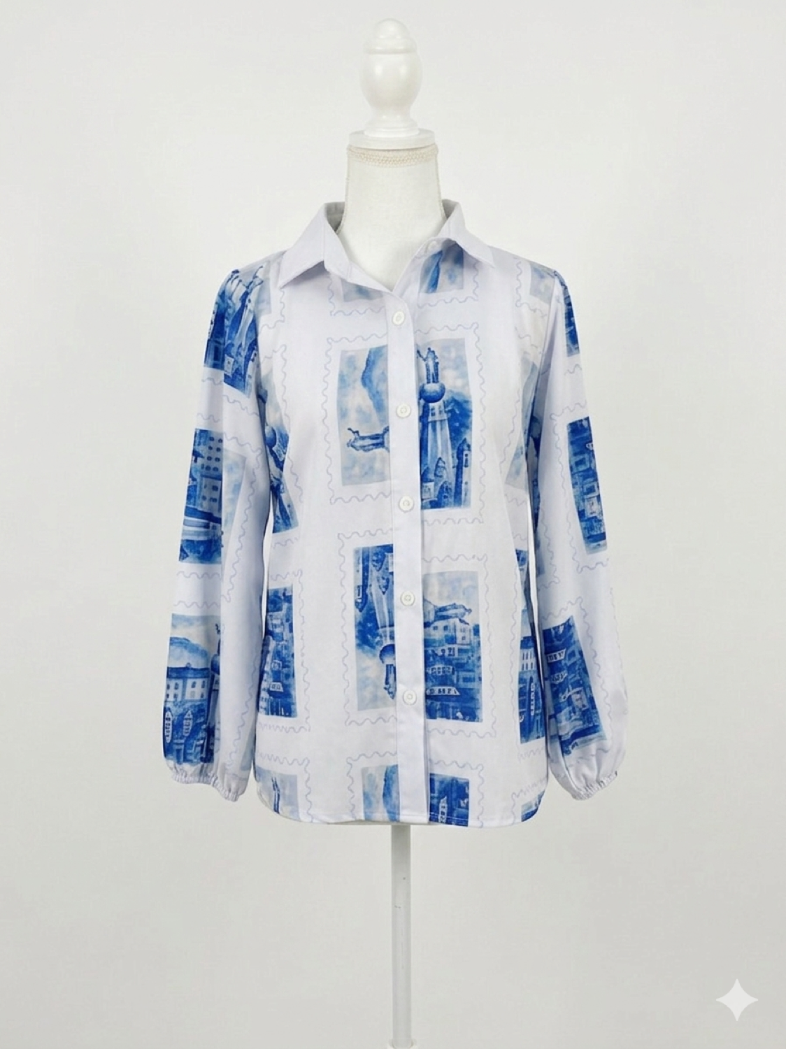 Blusa Postales
