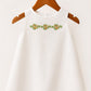 Vestido bordado con pajaritos