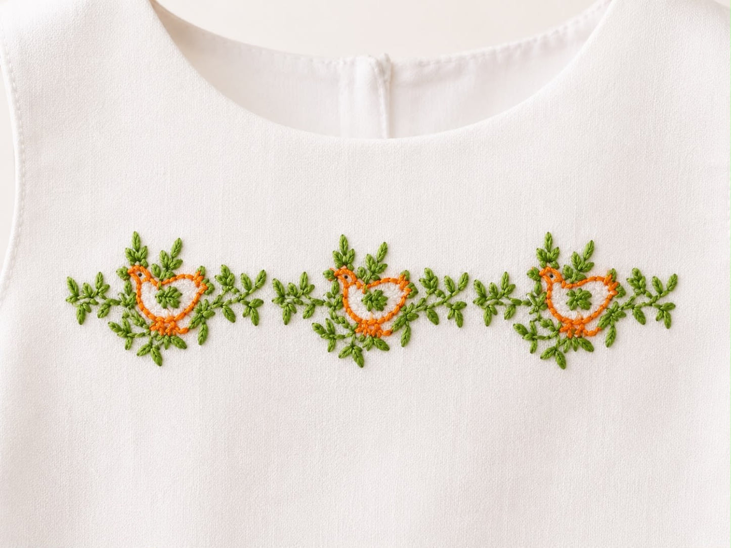 Vestido bordado con pajaritos