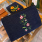 Cosmetiquera bordada con flores